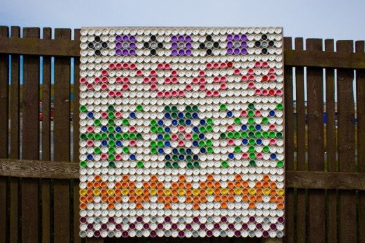 Bottle top Fair Isle art created and donated by a local school