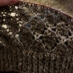 WIP of the Peerie Leaves sweater. A woolly leave lace design in grey yarn